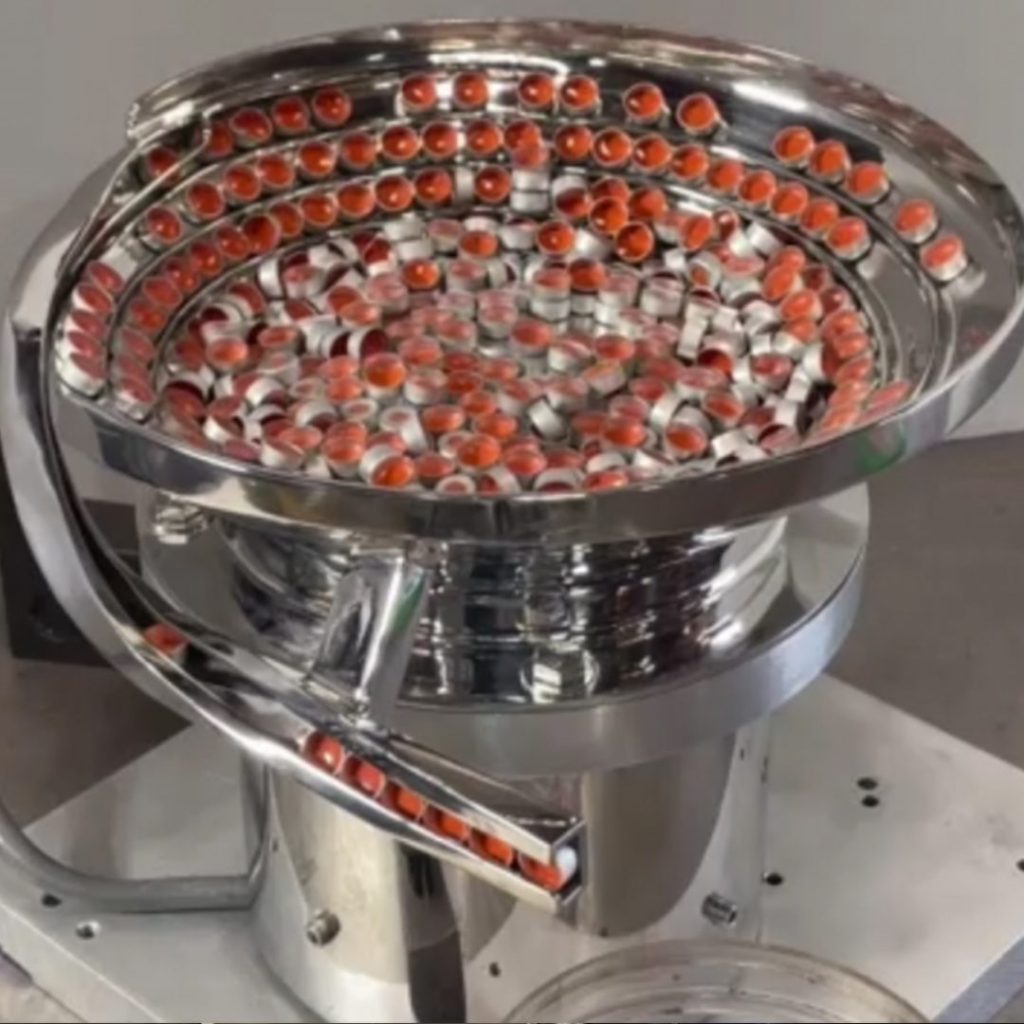 Vibratory Bowl Feeder for plastic caps